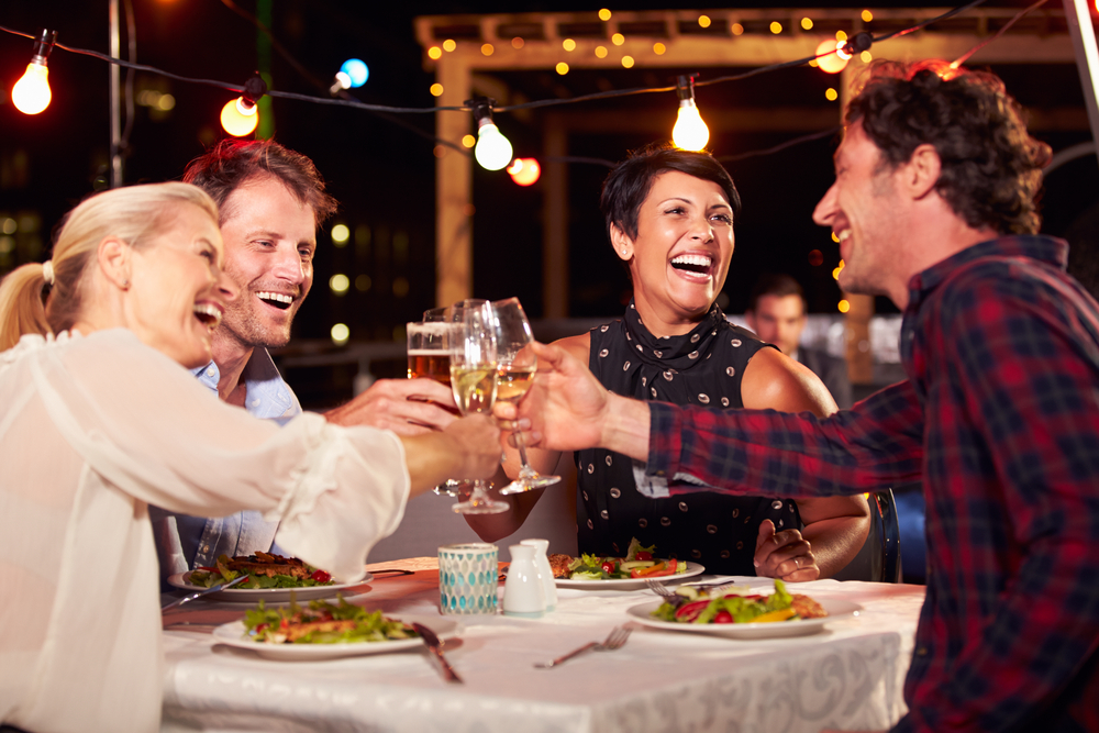 Group of friends at a rooftop restaurant