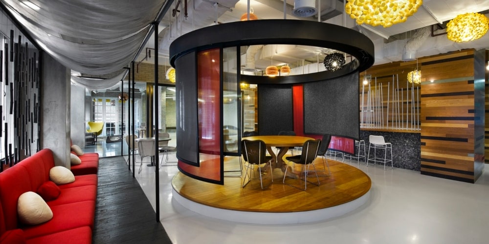 trendy office space utilising the colours red and black 