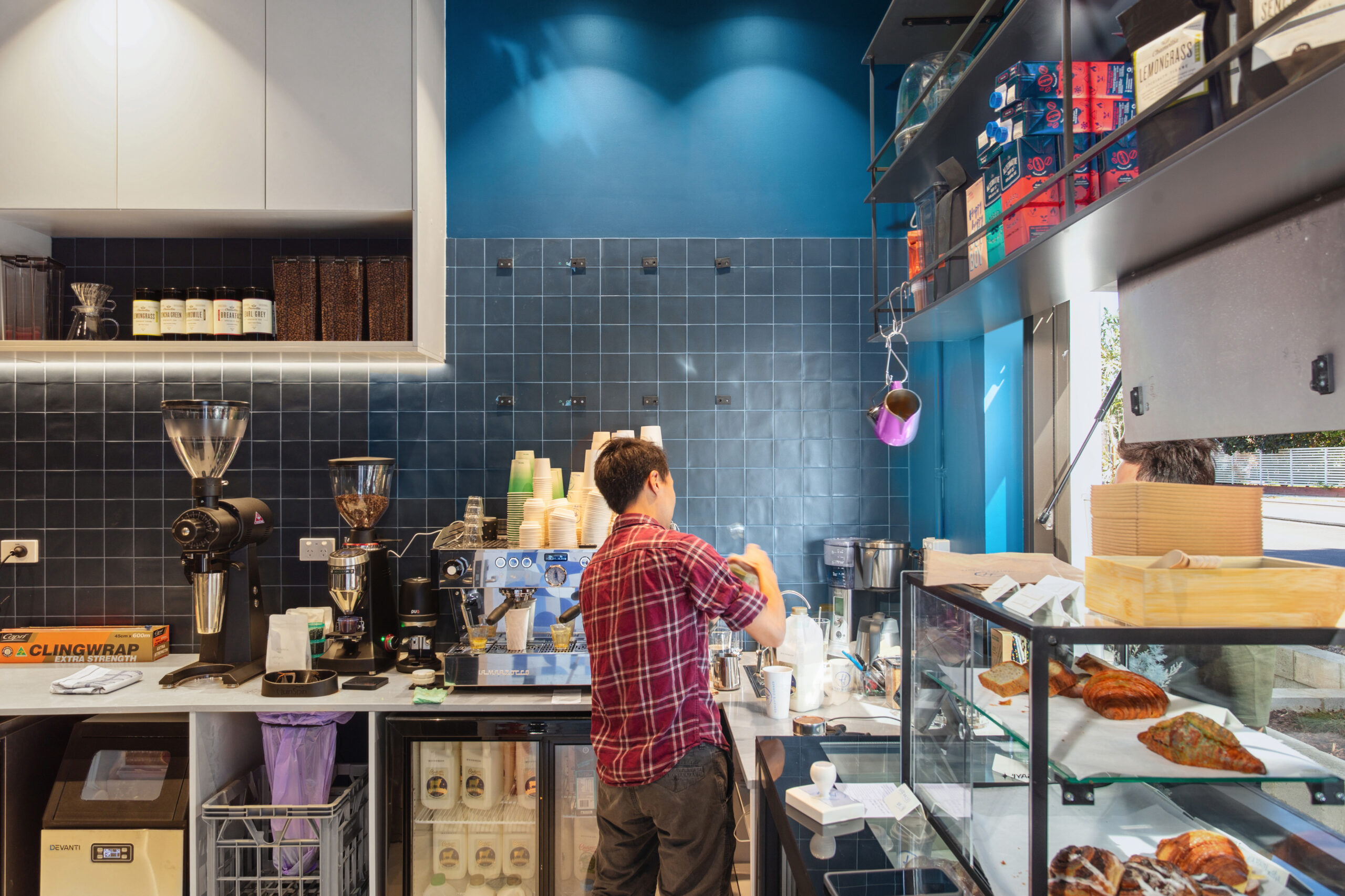 A man working on the commercial kitchen fitout of Henley's Corner in Como, Perth