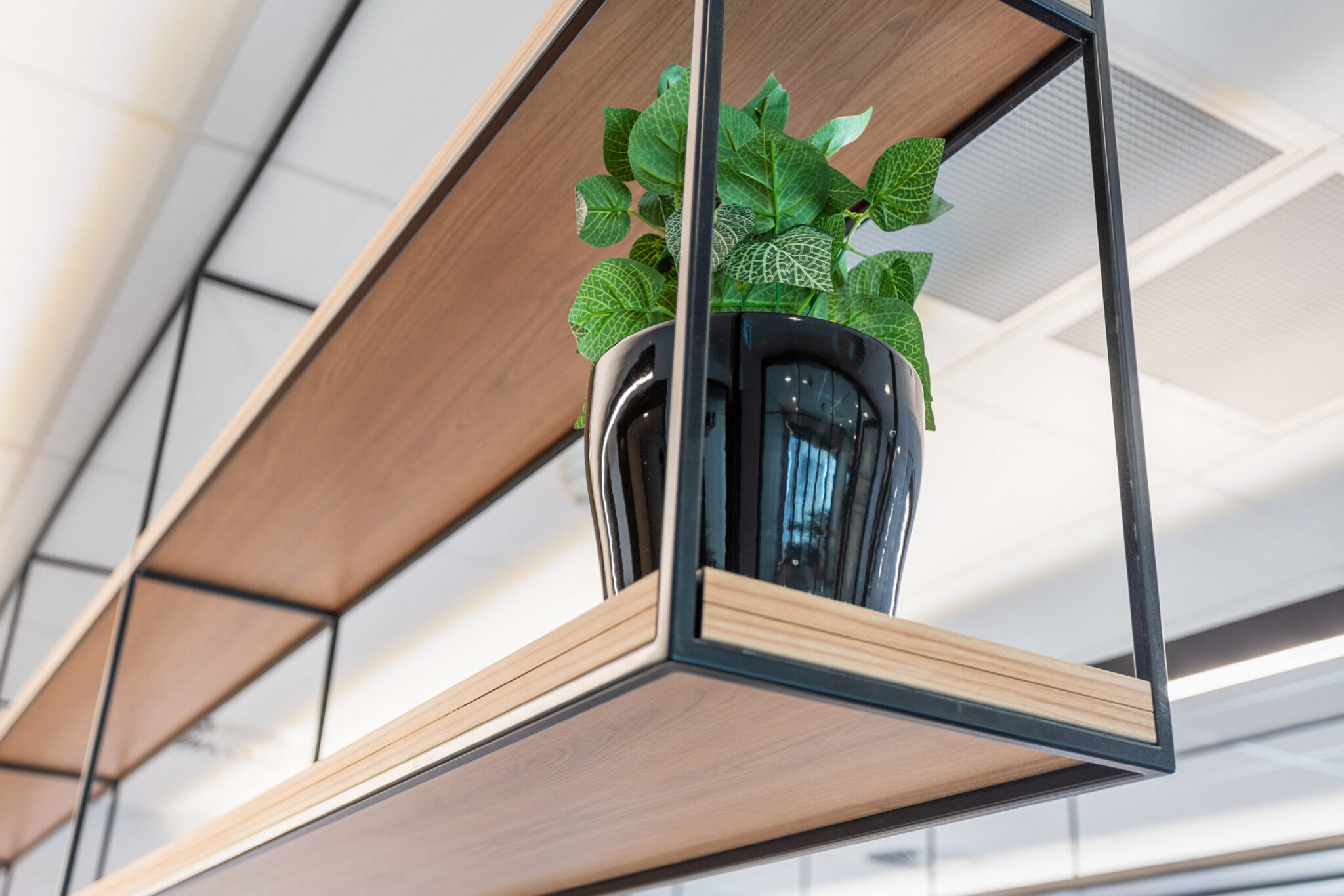 what will replace engineered stone - an image of detailing in the Chung Wah Association office; showcasing the use of HPL and compact laminate